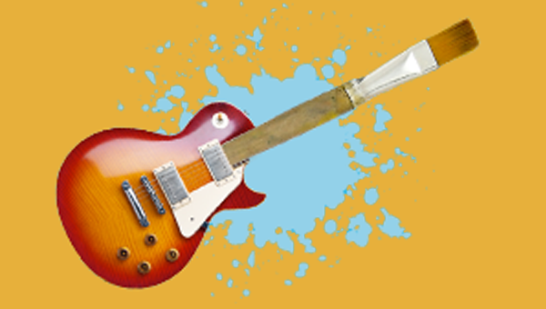 guitar against splatter mark and beige background